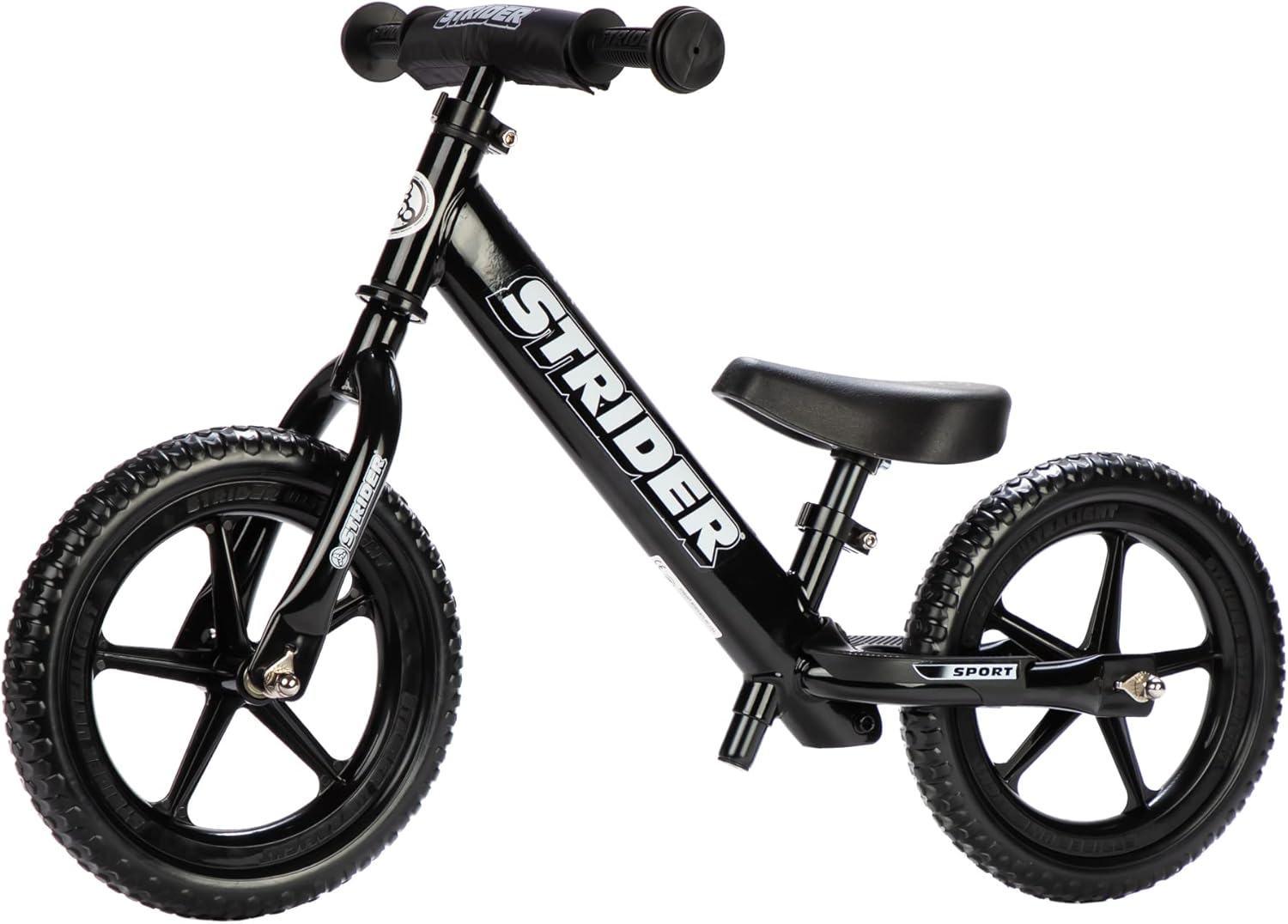 Black Strider balance bike on a white background