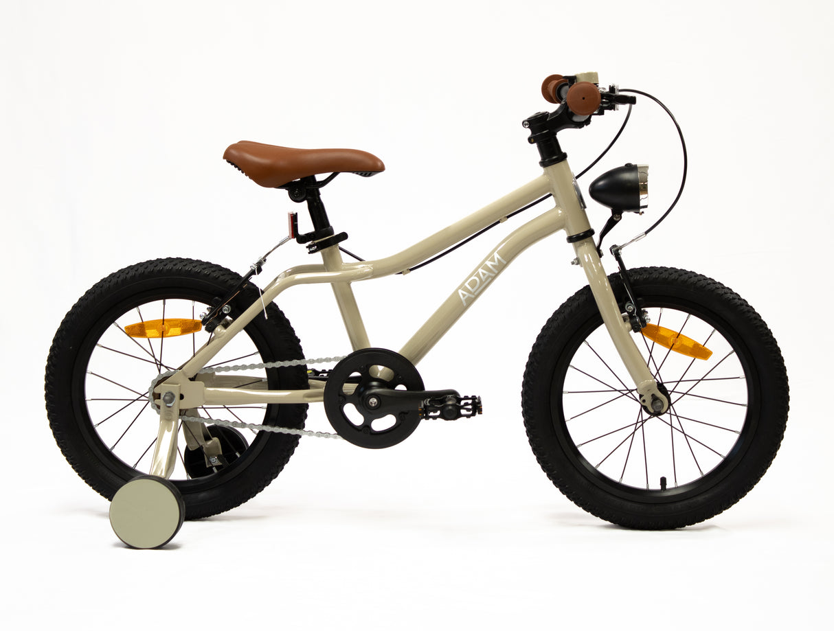Children's mountain bike with a beige frame and training wheels on a white background