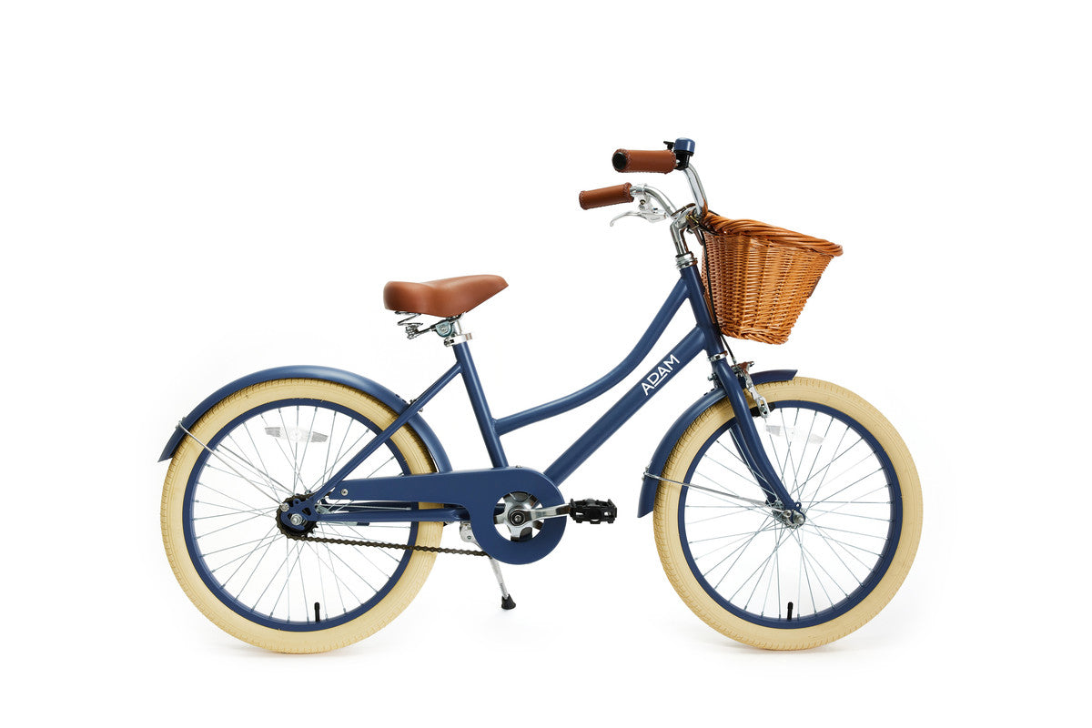 Blue bicycle with a brown basket on a white background