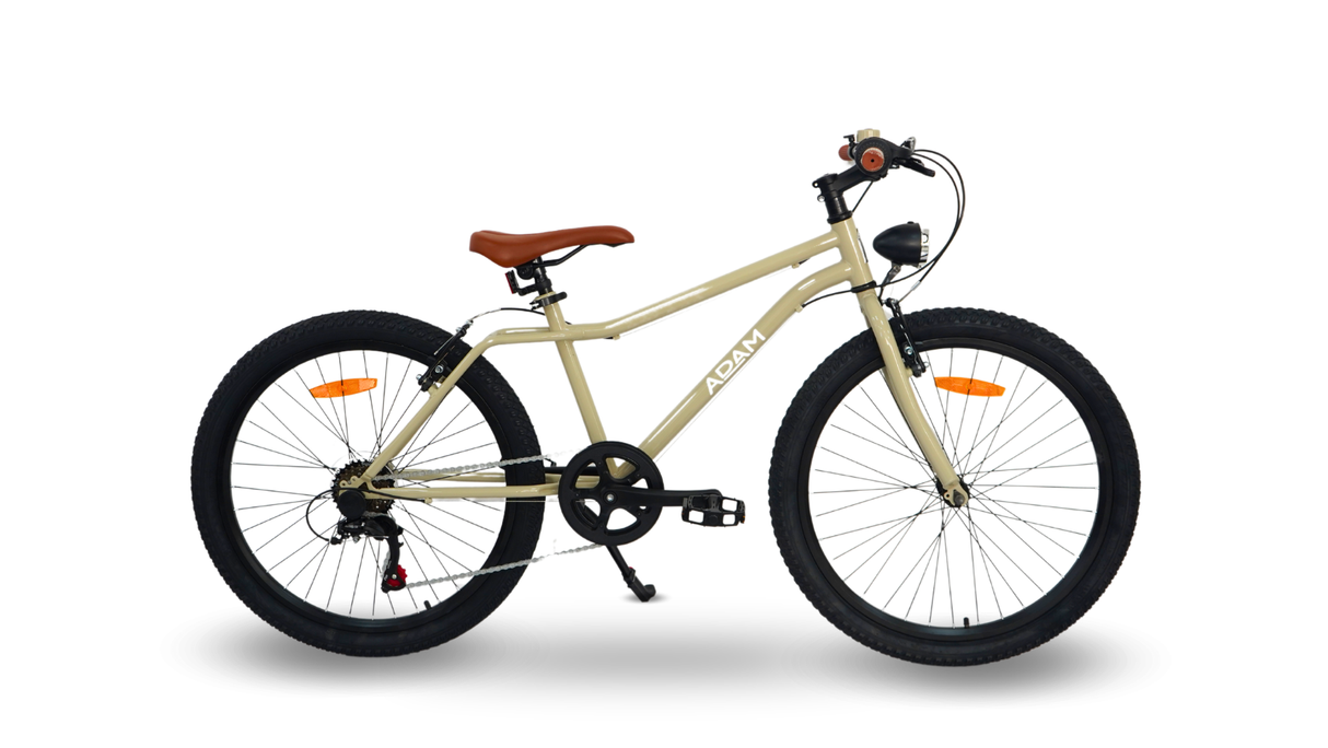 Beige children's bicycle with black wheels on a white background