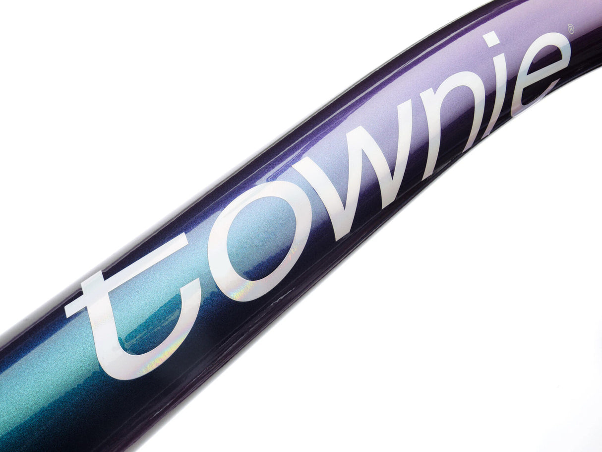 Close-up of a purple and blue handlebar with 'townie' branding on a white background