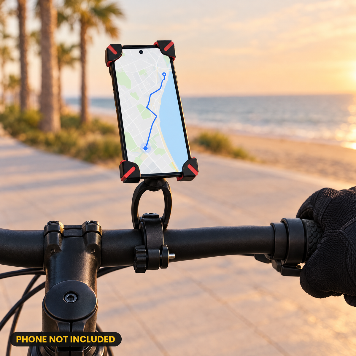 X-Grip phone holder mounted on a handlebar by the beach (phone not included)