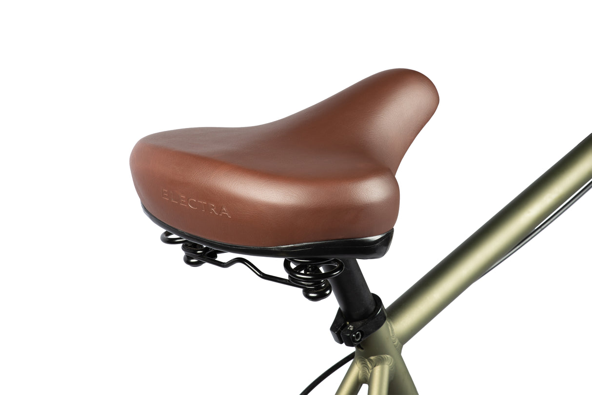 Brown bicycle seat with Electra branding on a white background