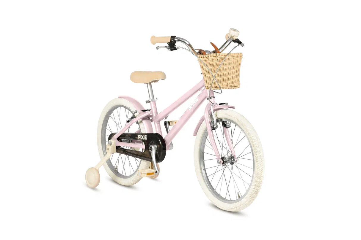 Pink children's bicycle with a basket on a white background
