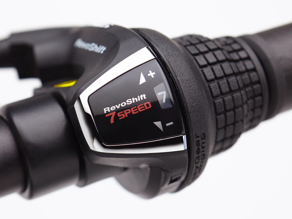 RevoShift 7-speed shifter on a bicycle handlebar with a white background