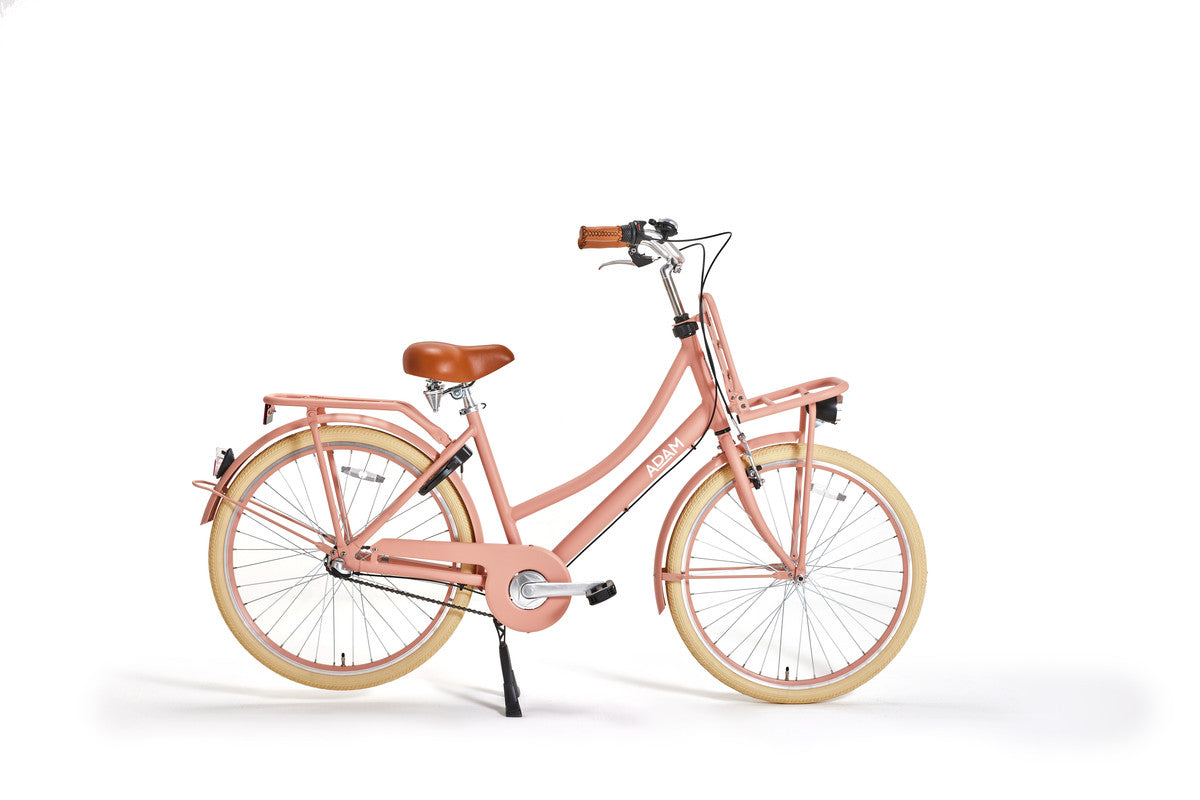 Peach bicycle with a brown seat on a white background