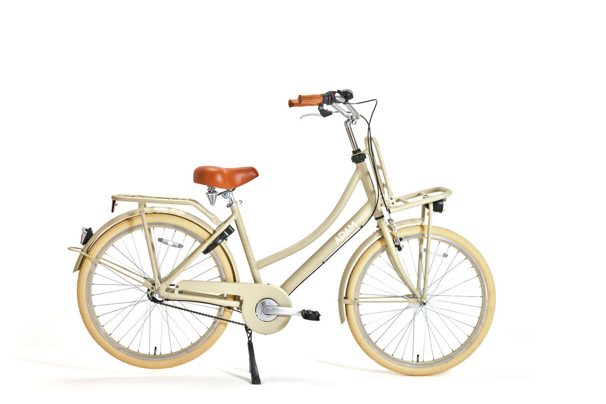 Cream bicycle with a brown seat on a white background