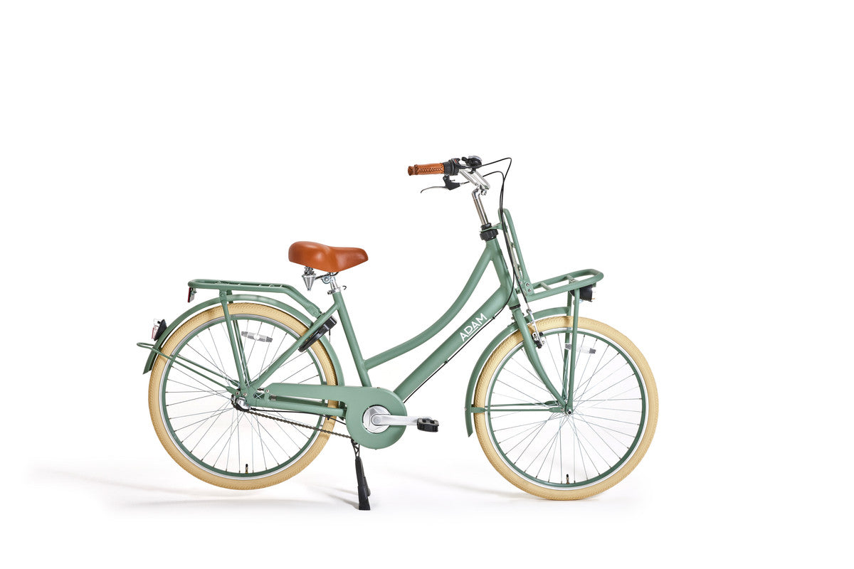 Green bicycle with a brown seat on a white background