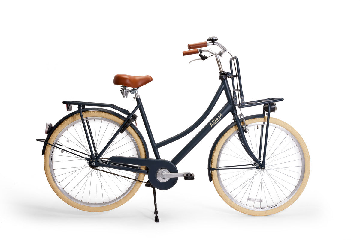 Navy bicycle with beige tires on a white background