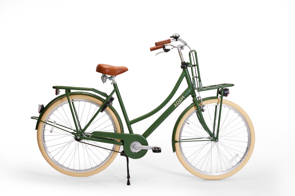 Green bicycle with brown seat on a white background