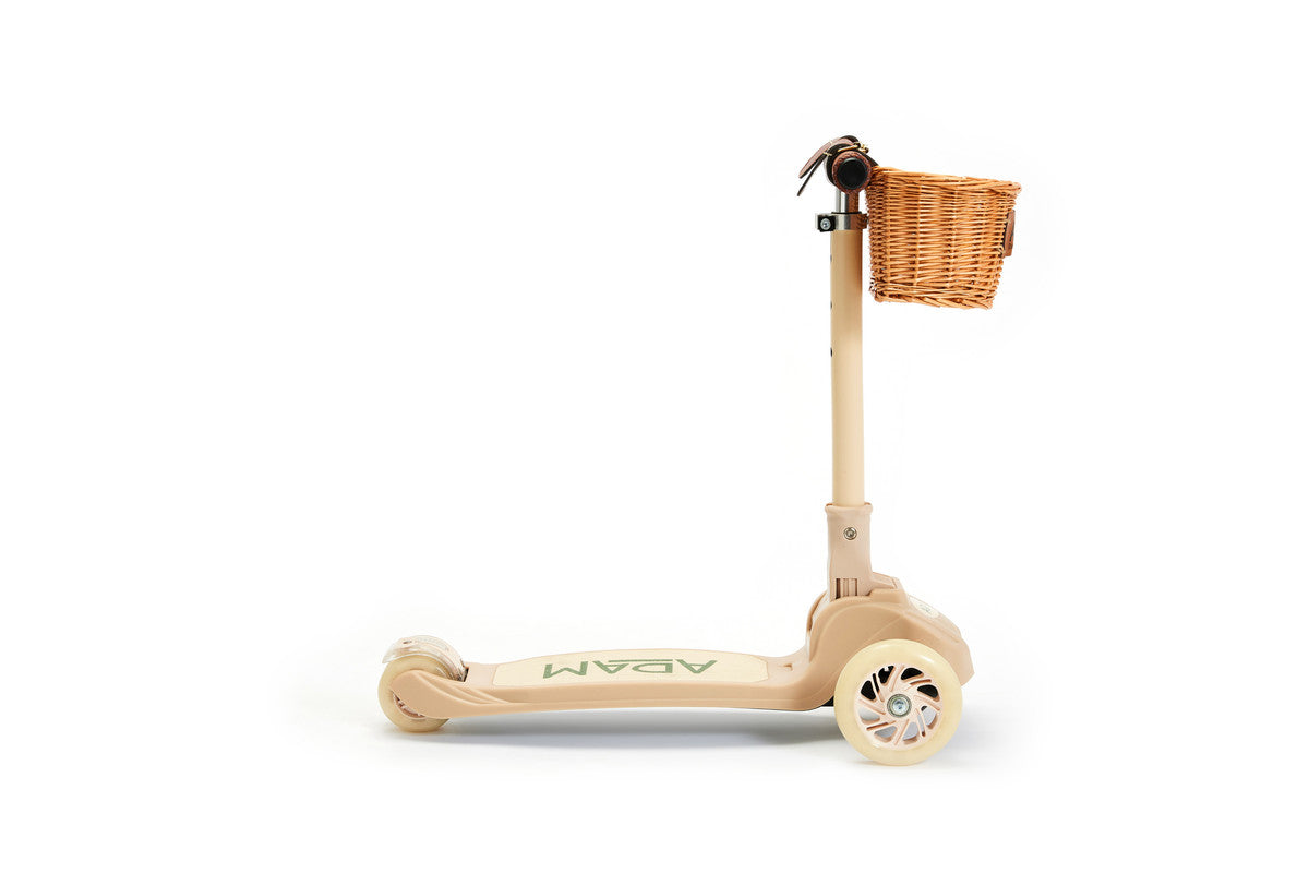 Children's scooter with a basket on a white background