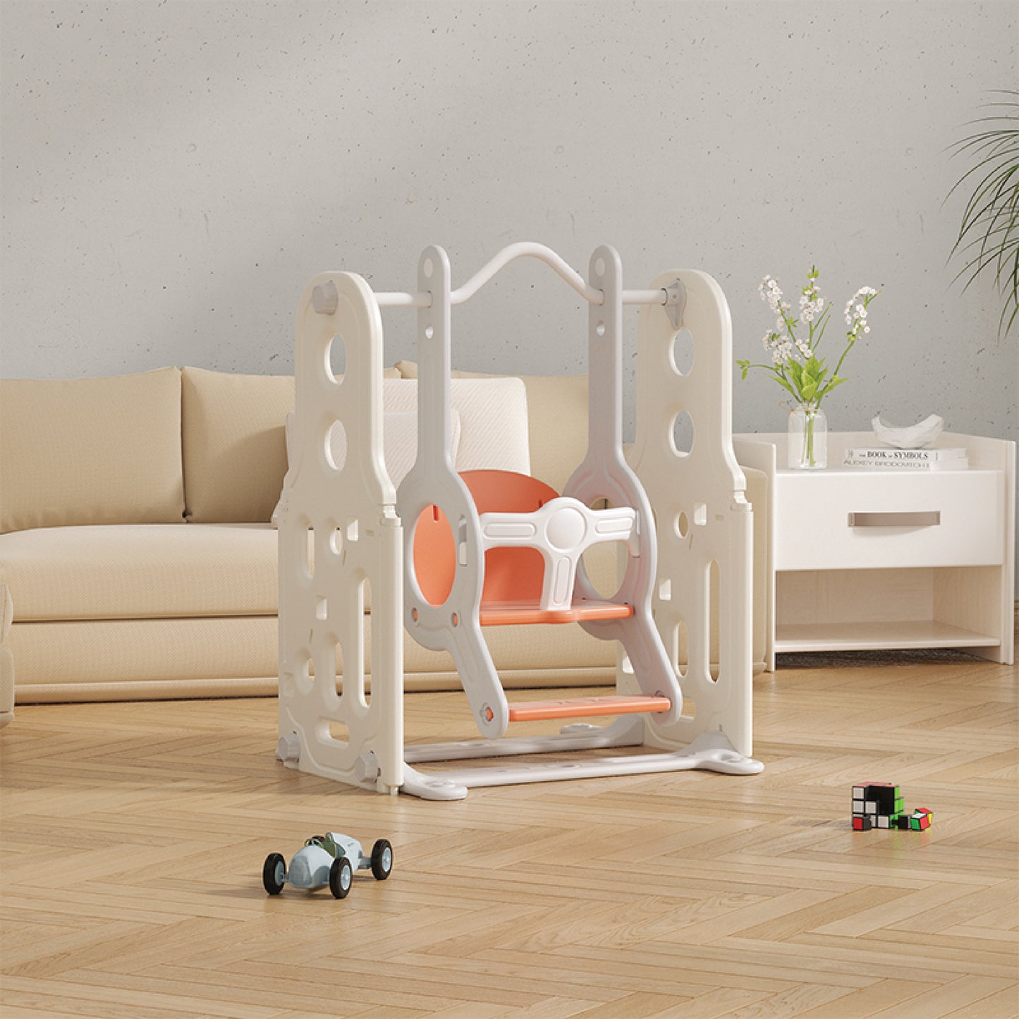Children's play swing with orange seat in a living room setting