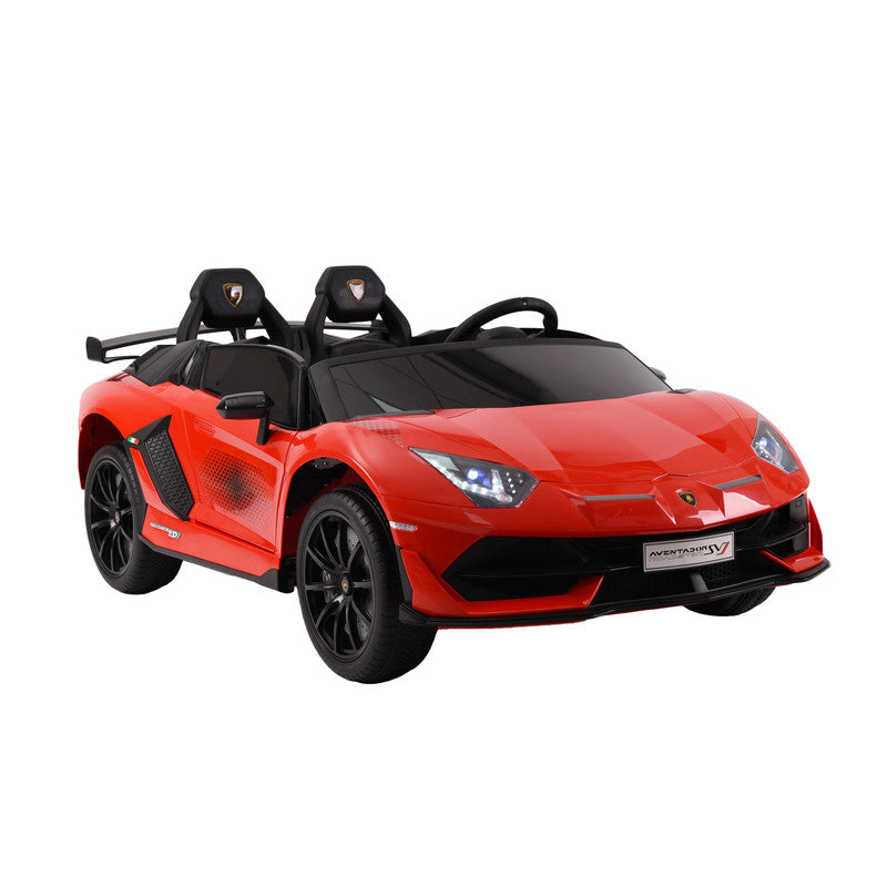 A red Lamborghini Aventador SVJ kids ride-on car with scissor doors, LED lights, and dual leather seating.