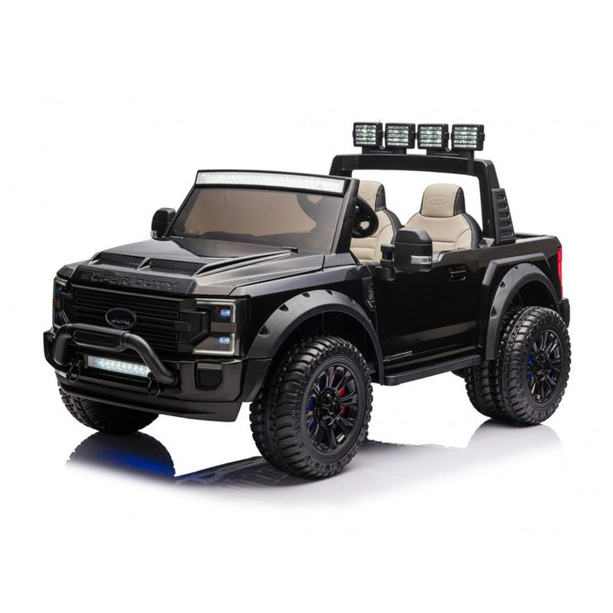 Black toy truck with Ford logo and detailed features on a white background