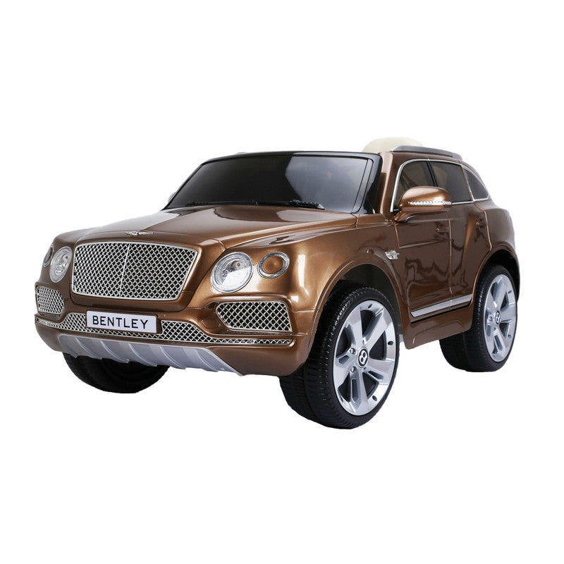 A bronze Bentley Bentayga kids electric ride-on car with a luxurious interior and silver wheels.