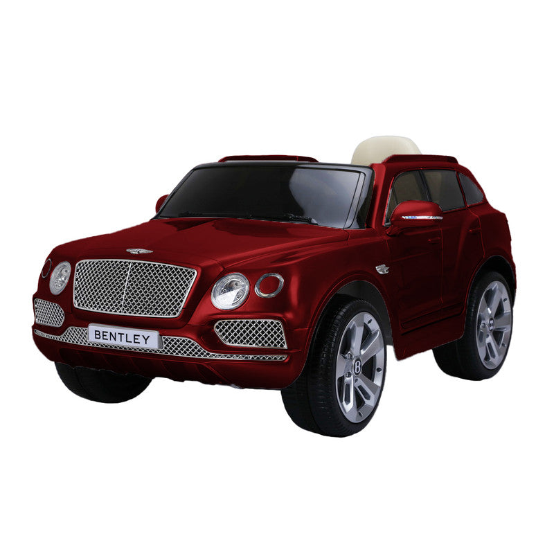 A red Bentley Bentayga kids electric ride-on car with a luxurious interior and silver wheels.