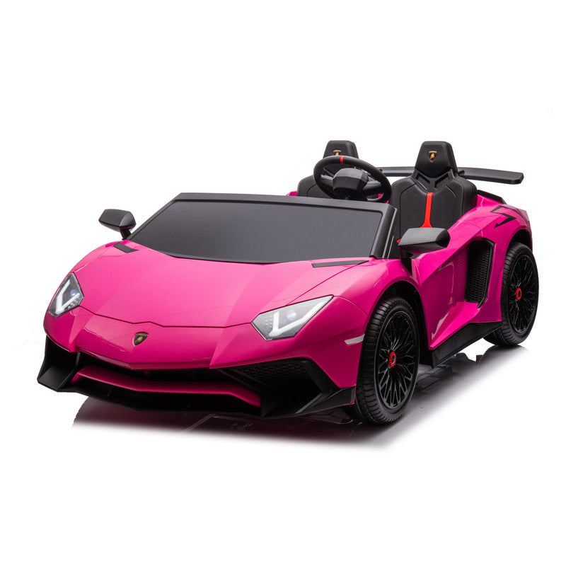A pink Lamborghini SVJ 2-Seater Ride-On Car for kids with black wheels and leather seats.