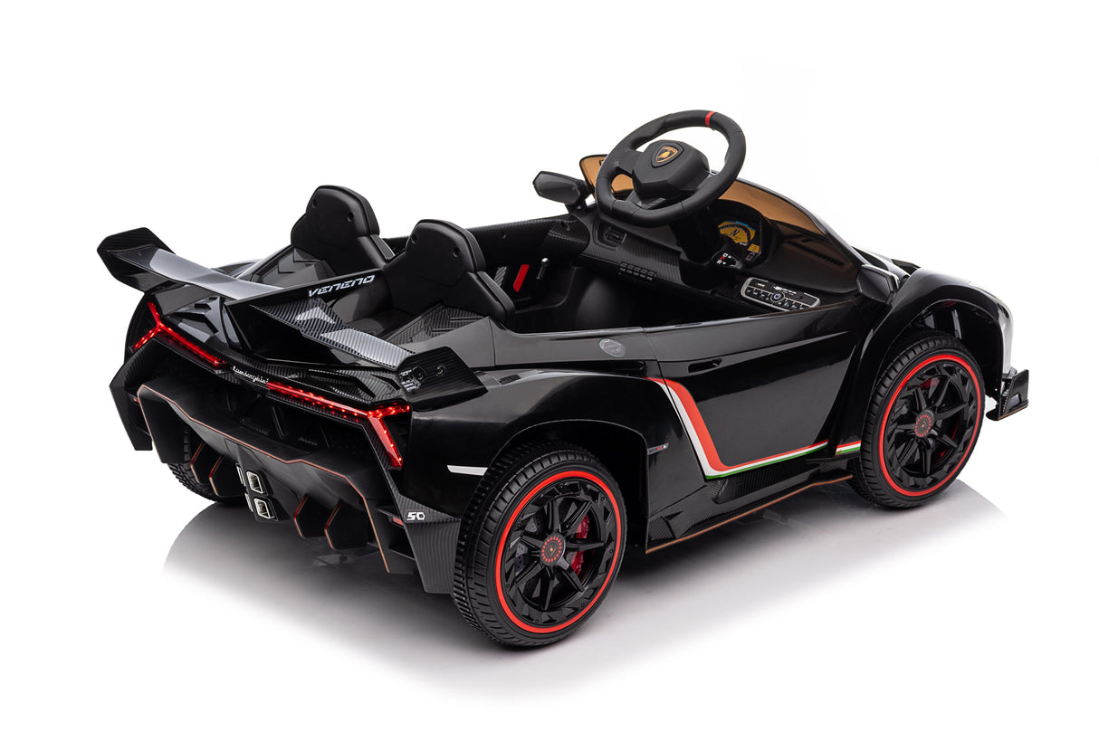 Black and red lamborghini toy car on a white background