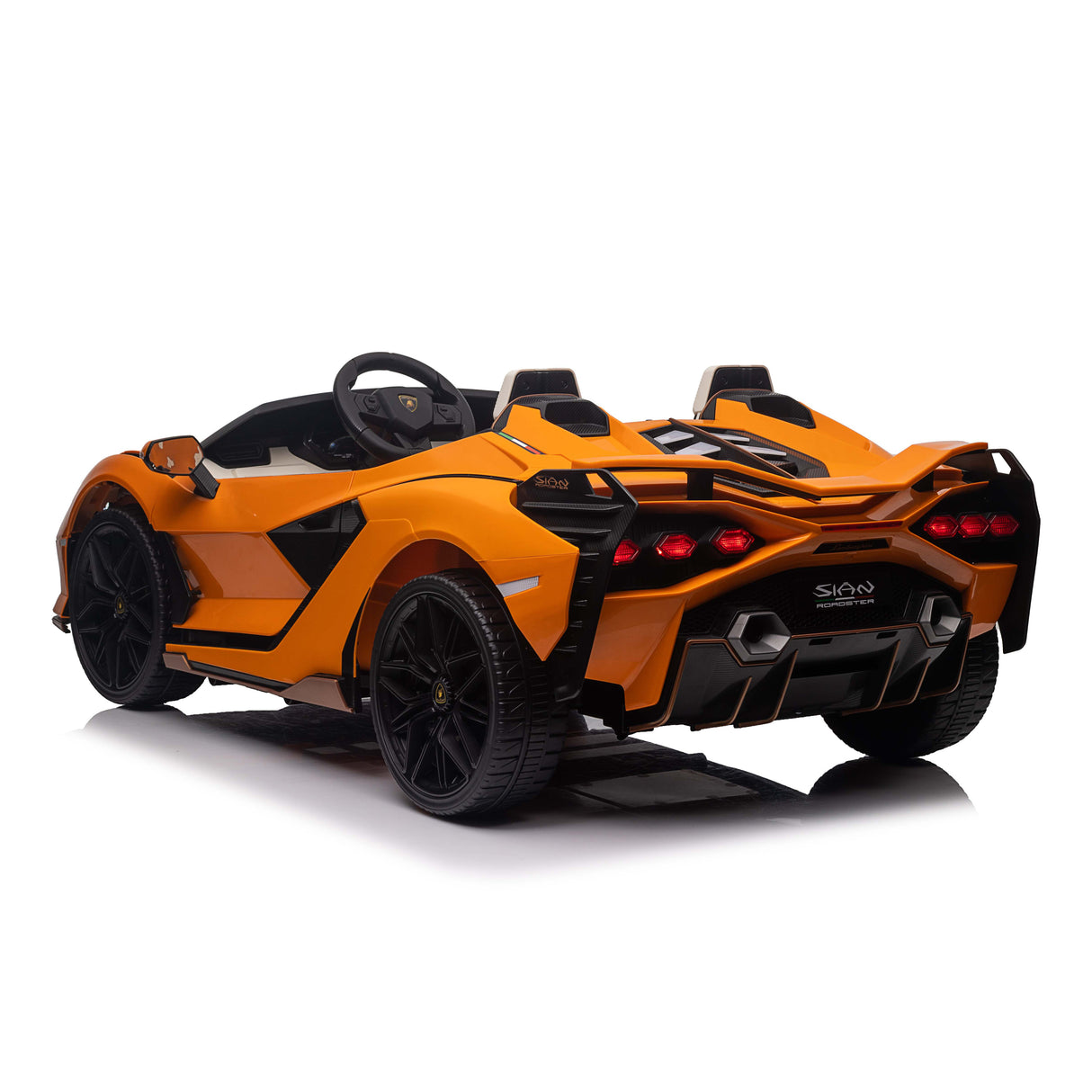 Orange lamborghini sian roadster toy car with black accents on a white background