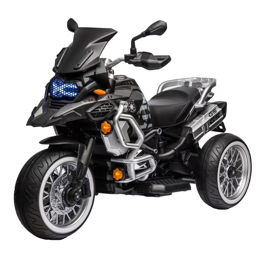 Black toy motorcycle with blue lights on a white background