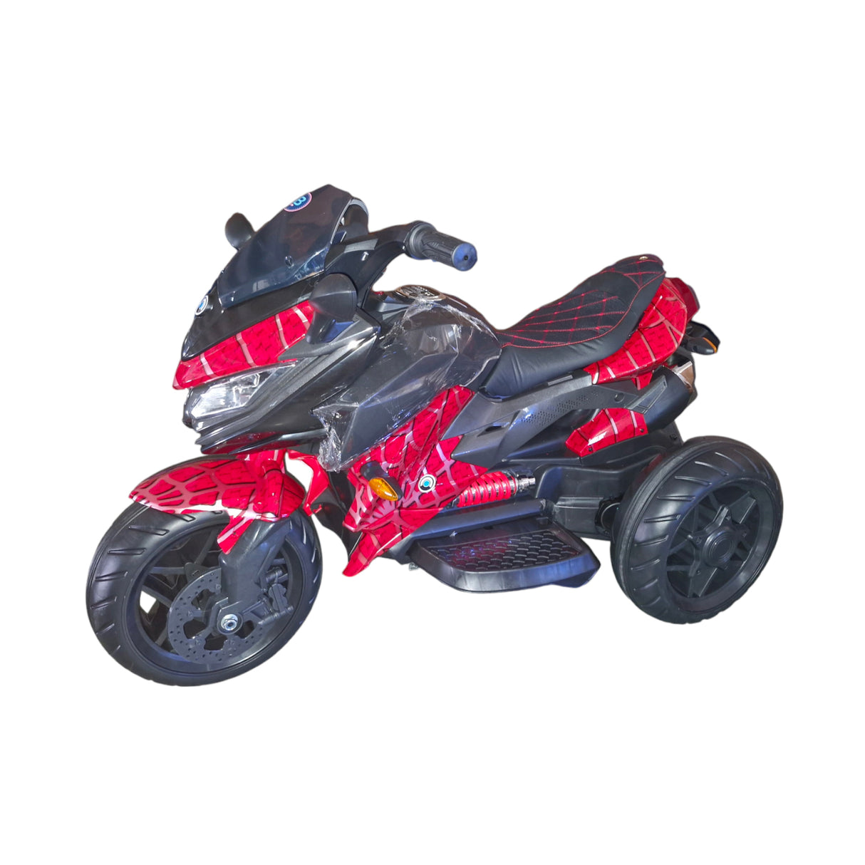 Red and black toy motorcycle on a white background