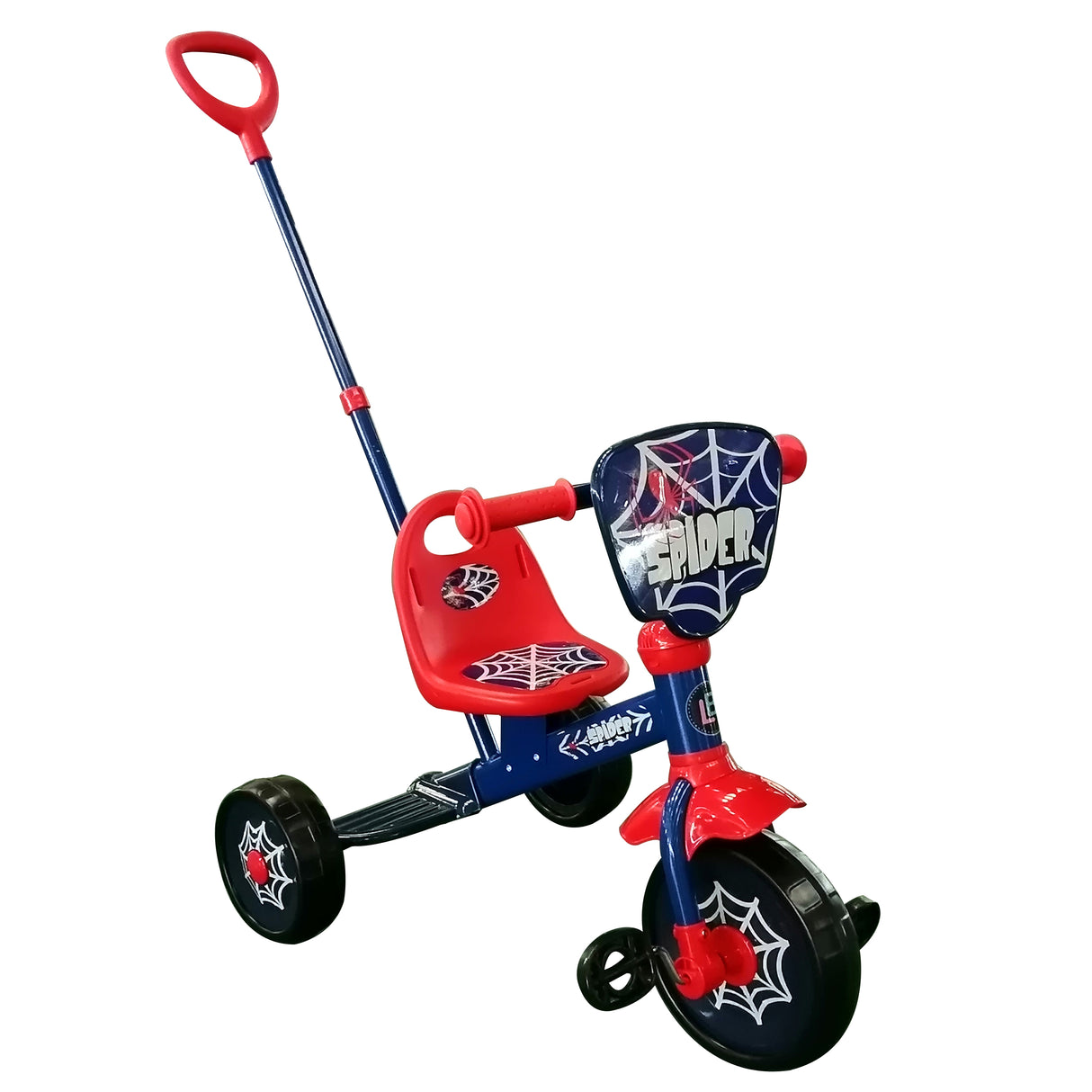 Child's red tricycle with spider design on a white background