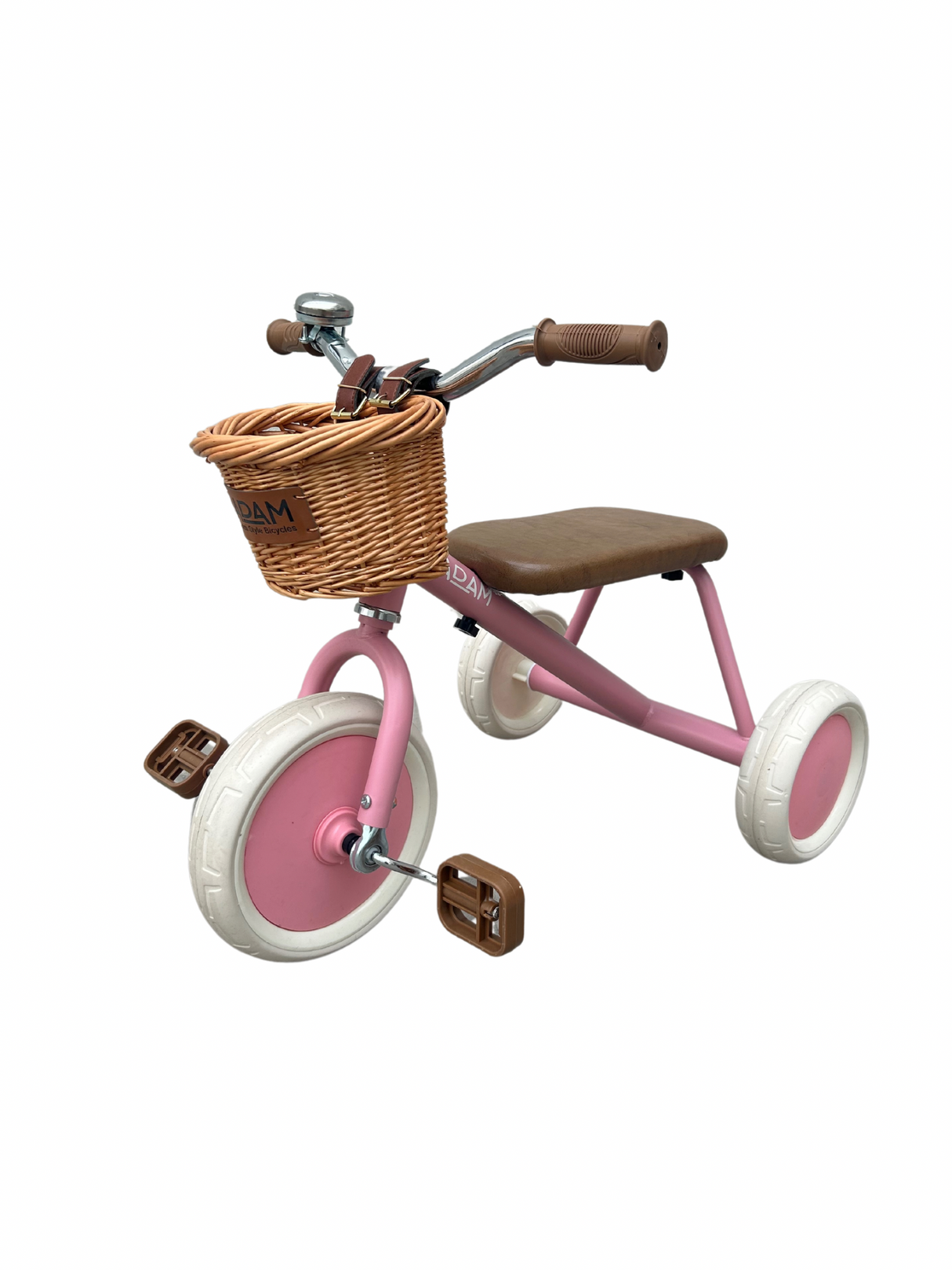 Pink tricycle with a wicker basket on a white background
