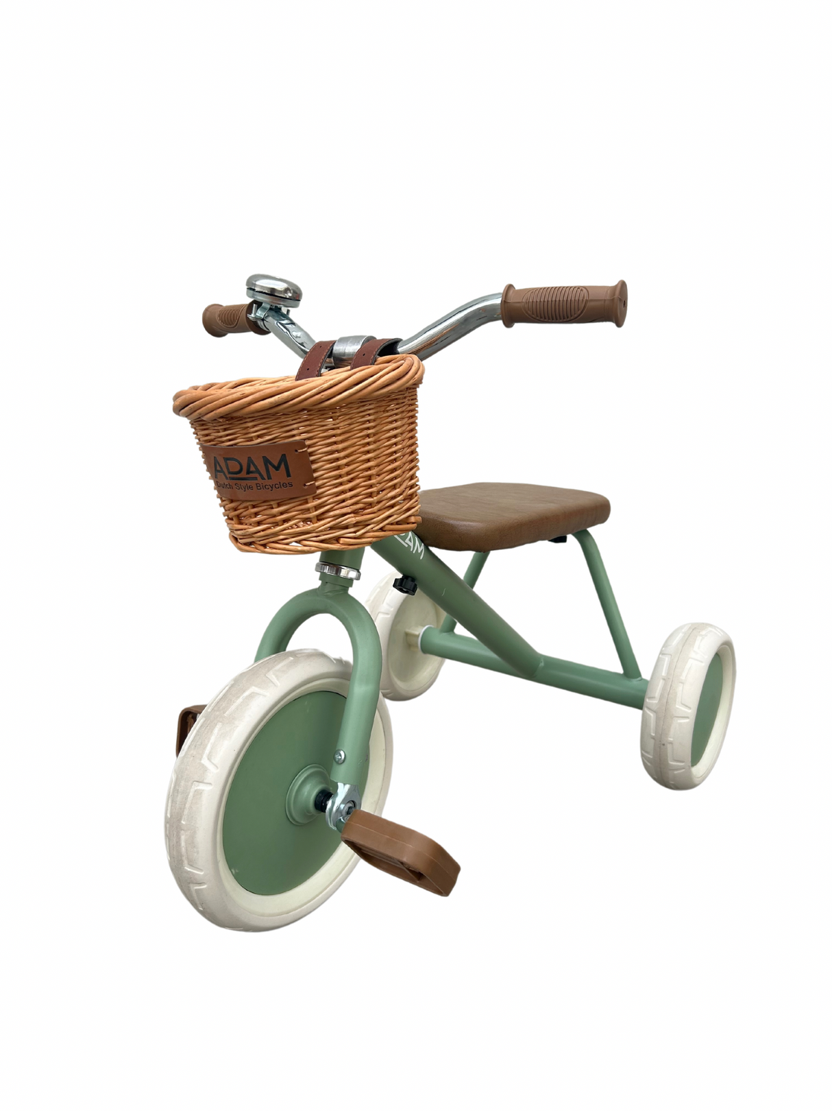 Children's tricycle with a wicker basket on a white background