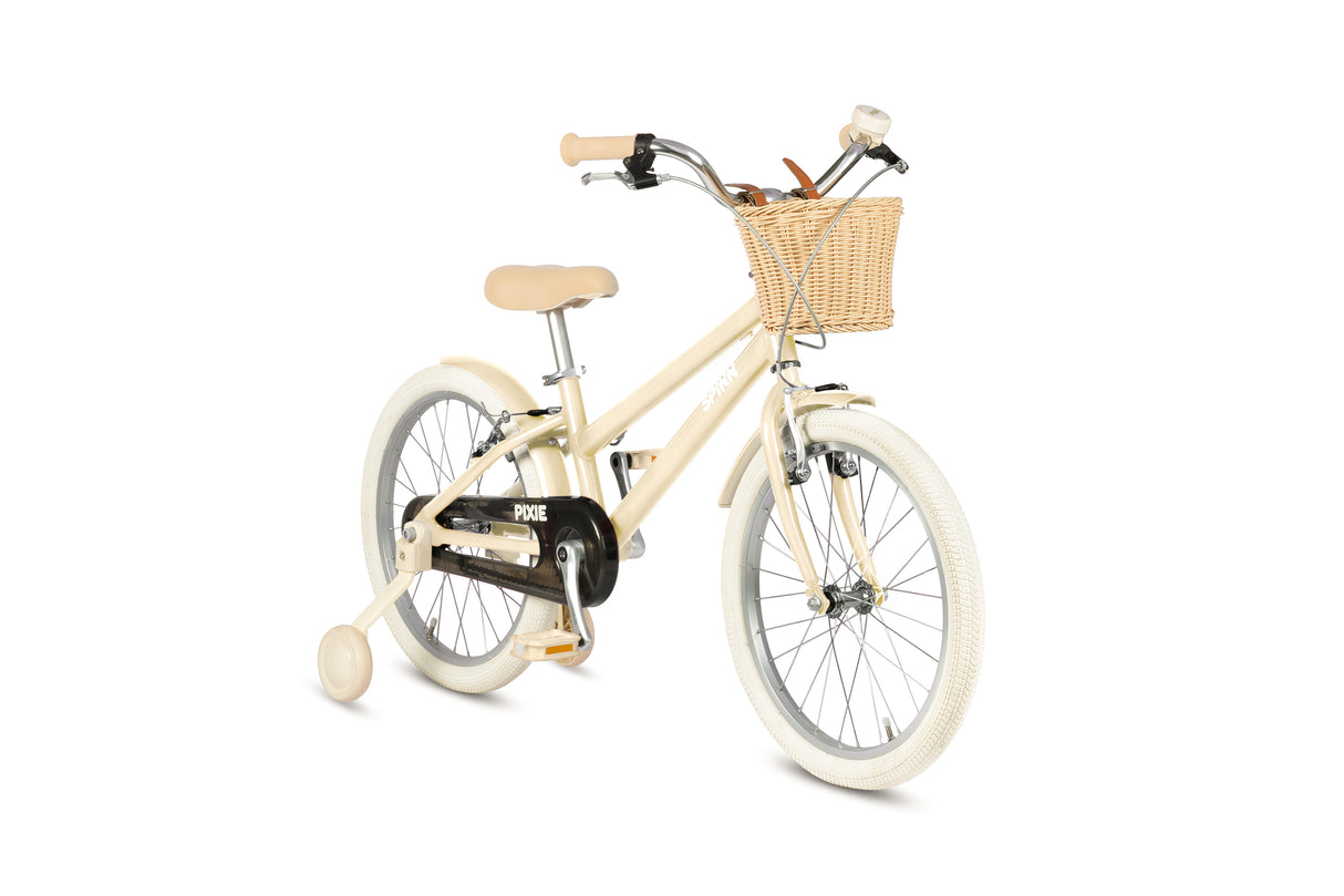Beige children's bike with a basket on a white background