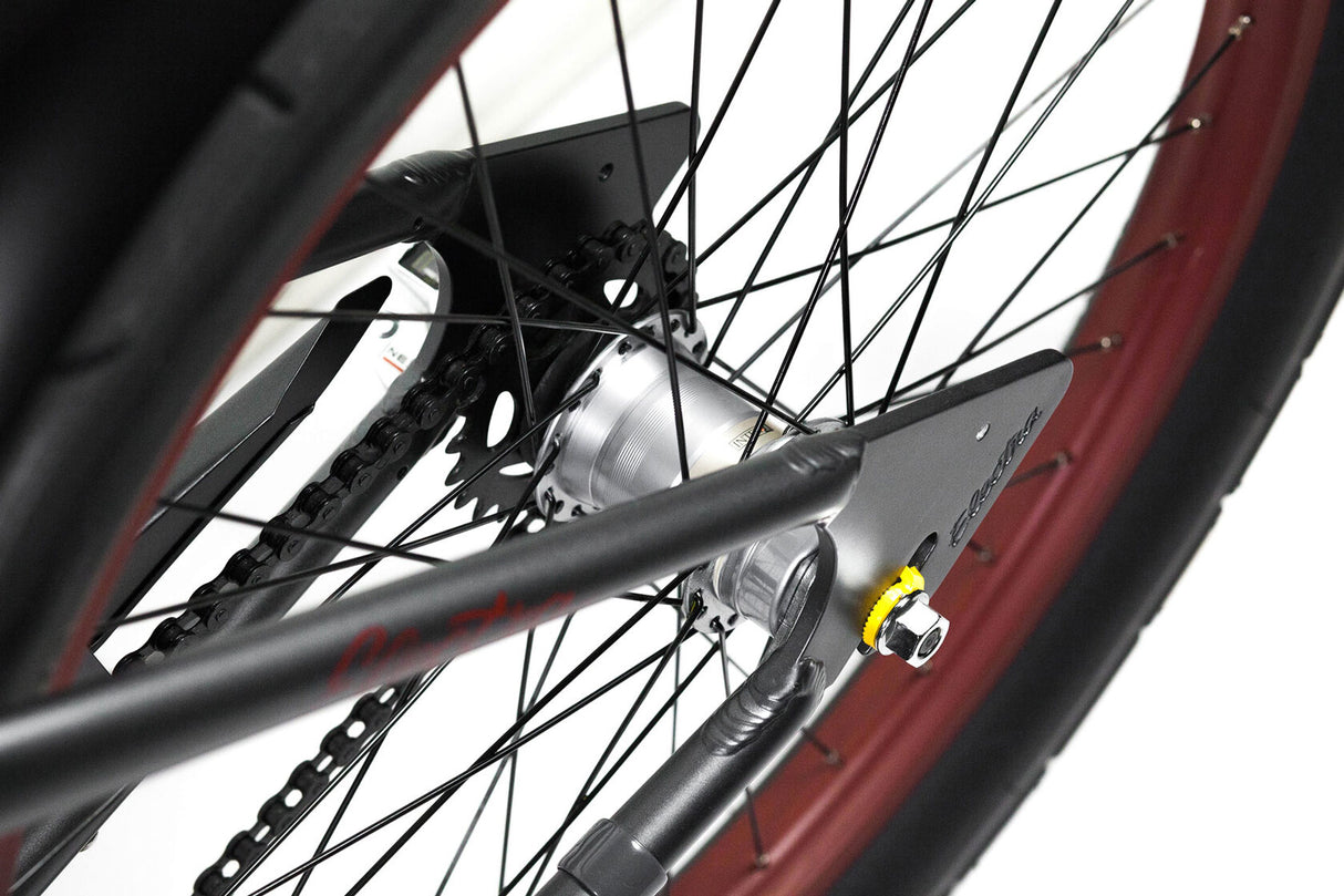 Close-up of a bicycle chain and gear system on a white background