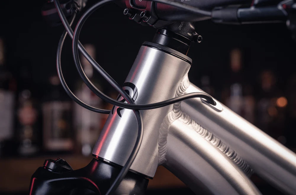 Close-up of a bicycle frame with blurred background