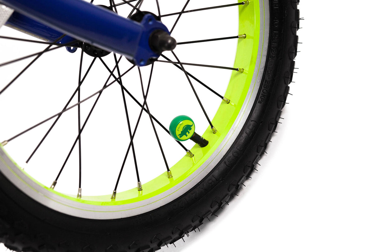 Close-up of a bicycle wheel with a blue hub and green valve cap on a white background