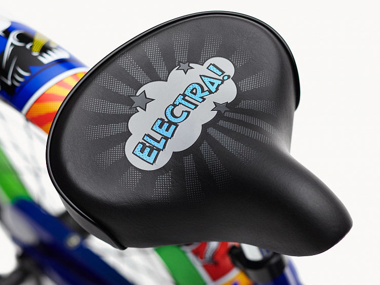 Bicycle seat with 'Electra!' branding on a colorful bike frame.