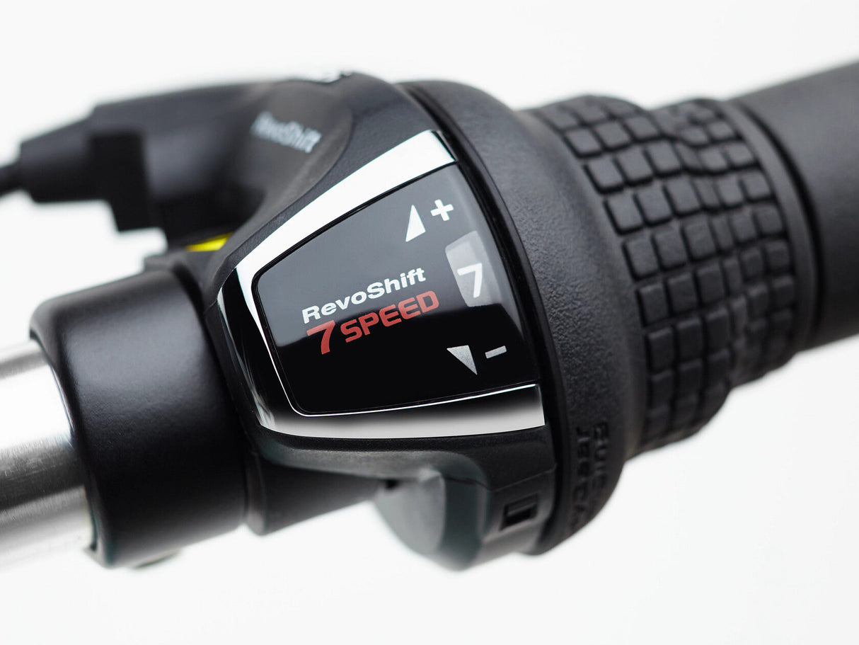 Close-up of a bicycle gear shift lever with 'RevoShift' branding on a white background