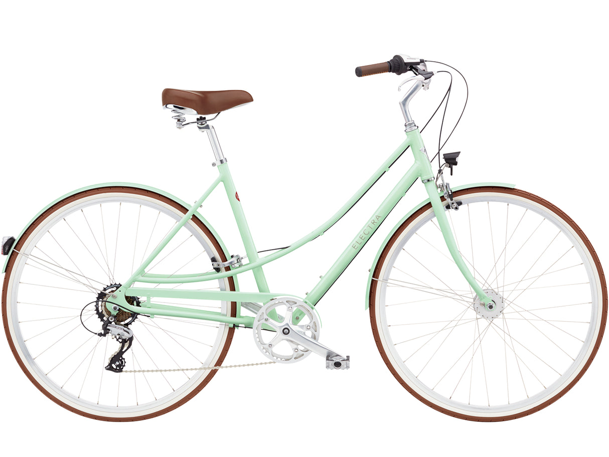 Mint green bicycle with brown wheels and seat on a white background