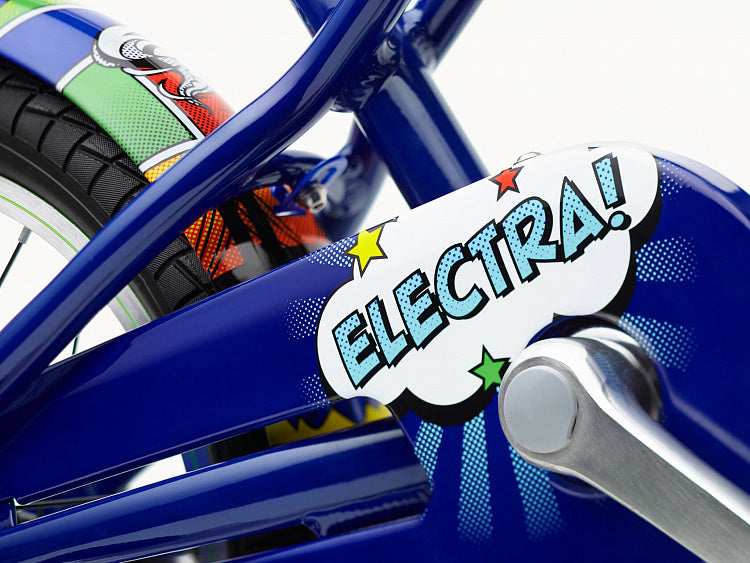 Close-up of a blue children's bike with 'ELECTRA!' branding on a white background