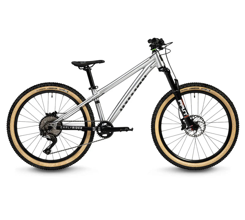 Mountain bike with tan tires on a white background