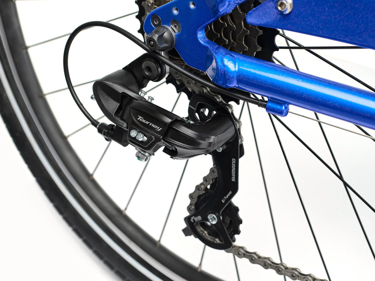 Close-up of a bicycle's gear system with a blue frame on a white background