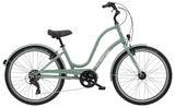 Green bicycle on a white background