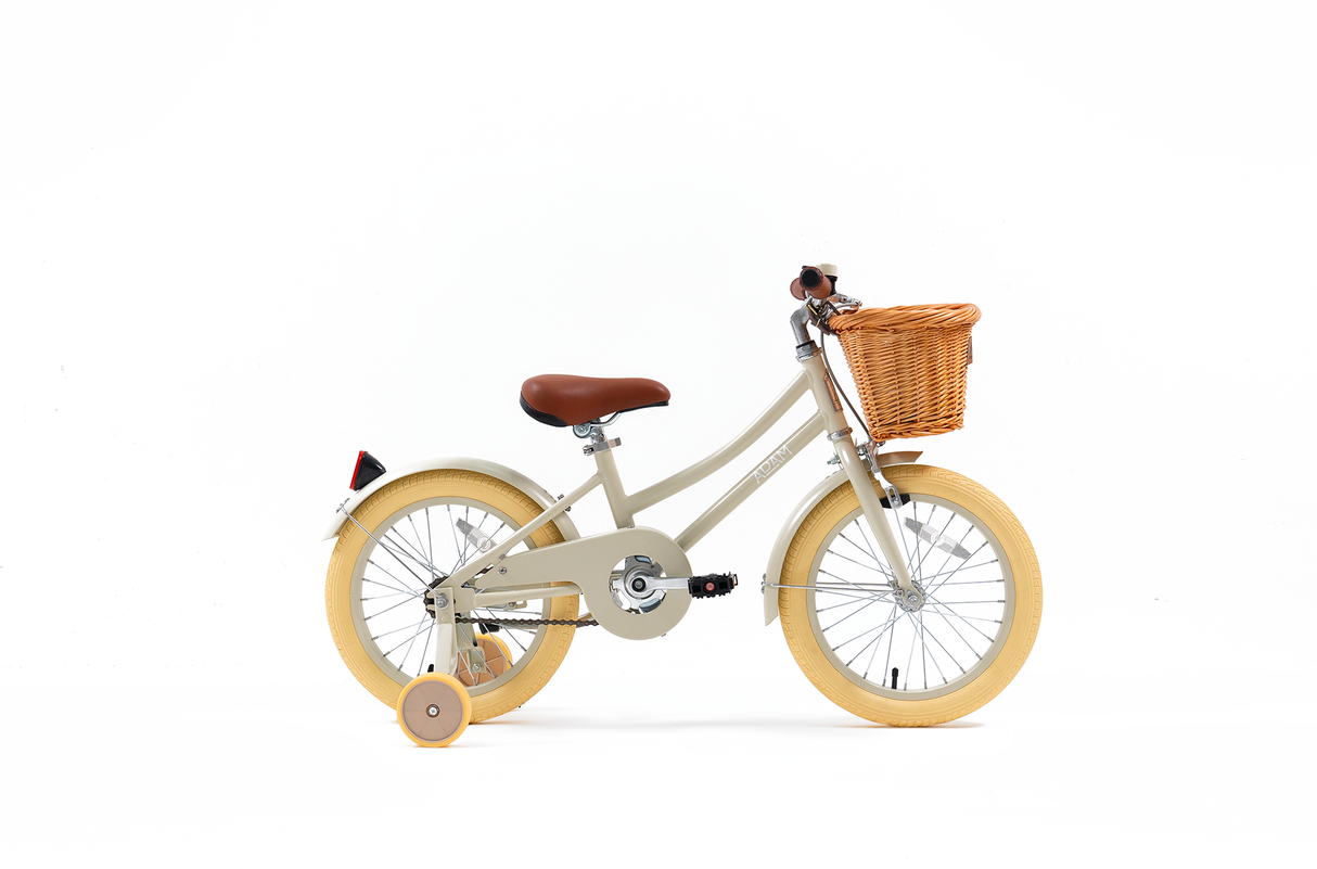 Children's bicycle with a basket on a white background