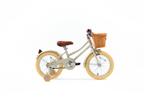 Children's bicycle with a basket on a white background