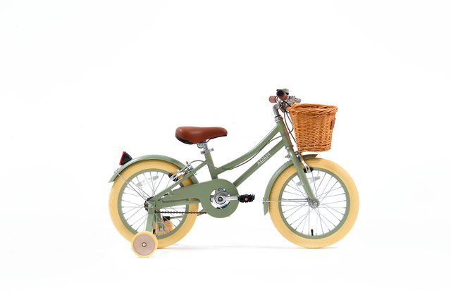 Children's bicycle with a basket on a white background