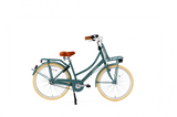 Turquoise bicycle with brown seat on a white background
