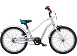 Children's bicycle with silver frame and black tires on a white background