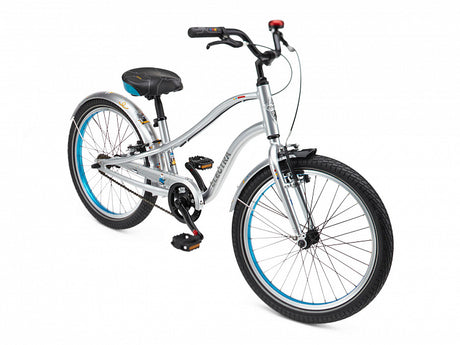 Silver children's bicycle with black seat and blue rim on a white background