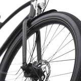 Close-up of a bicycle wheel with disc brake system on a white background