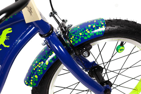 Close-up of a blue children's bike with green dinosaur graphics on a white background