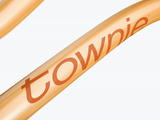 Close-up of a bicycle handlebar with 'townie' branding on a white background