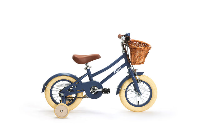 Children's bicycle with a basket on a white background
