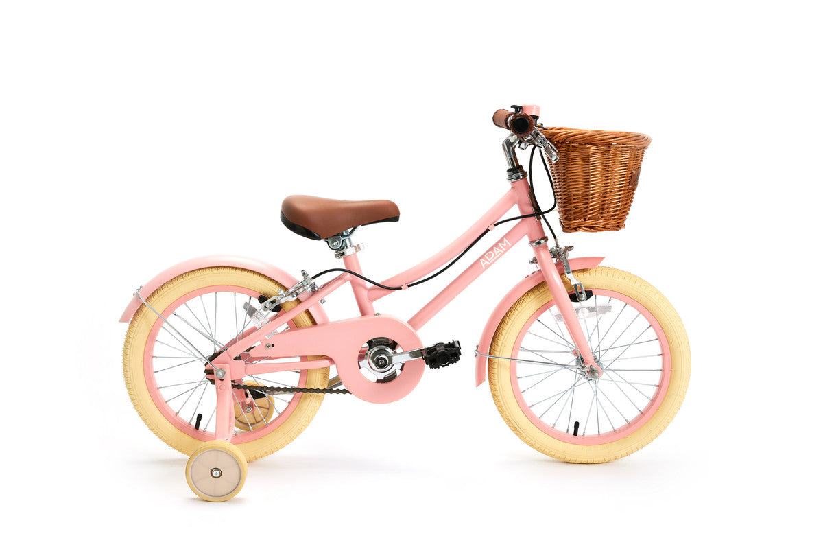 Pink children's bicycle with yellow wheels and a wicker basket on a white background